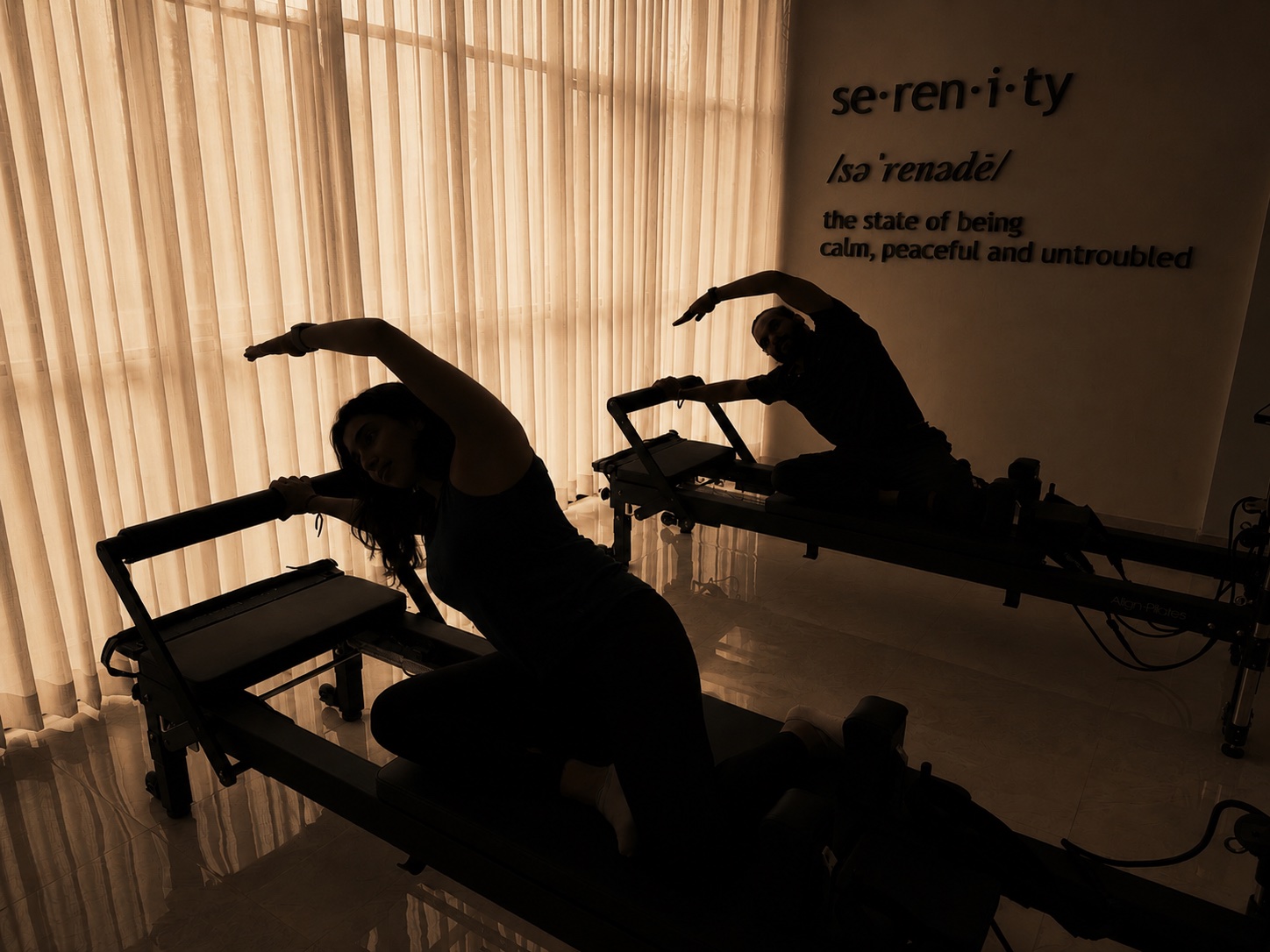 Pilates silhouette on reformer